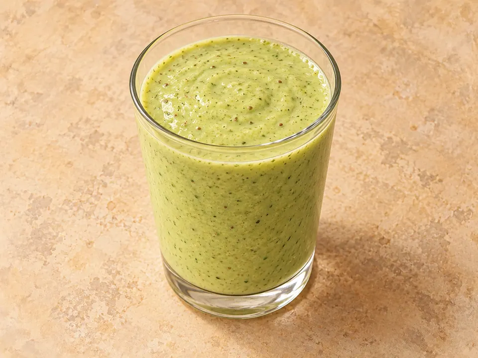 Illustration of a blended avocado, cucumber and lime smoothie with Greek yogurt and flaxseed.